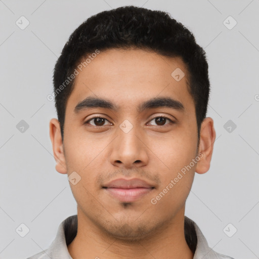 Neutral latino young-adult male with short  black hair and brown eyes