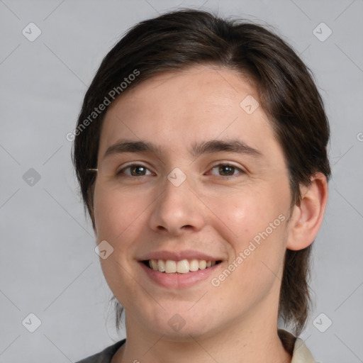 Joyful white young-adult male with medium  brown hair and brown eyes