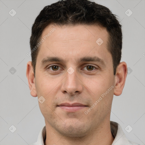 Joyful white young-adult male with short  brown hair and brown eyes