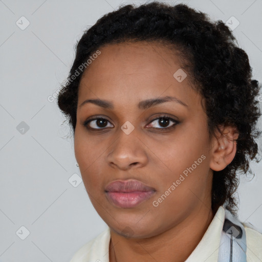 Neutral black young-adult female with short  brown hair and brown eyes