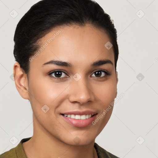 Joyful latino young-adult female with short  brown hair and brown eyes