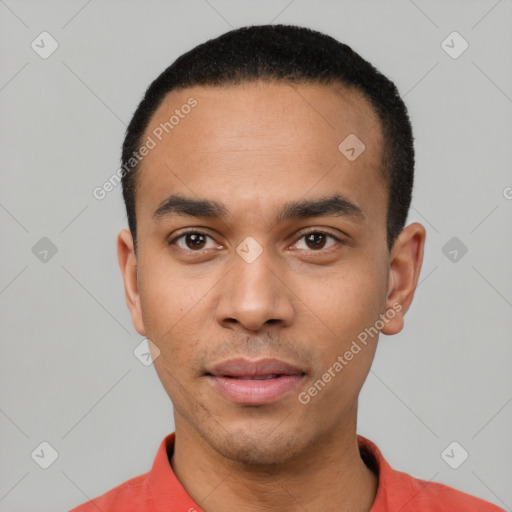 Neutral latino young-adult male with short  black hair and brown eyes