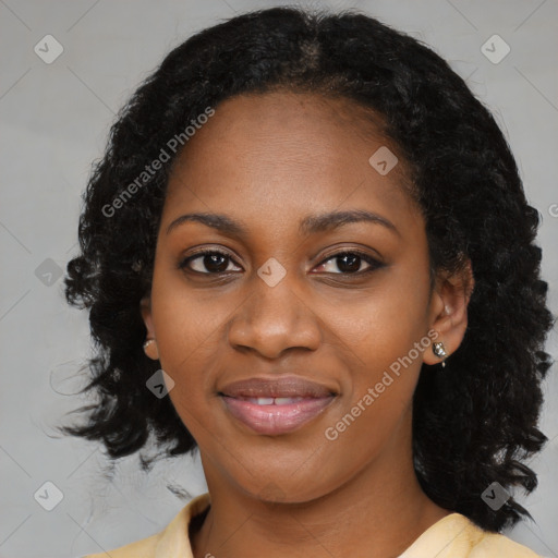 Joyful black young-adult female with medium  black hair and brown eyes