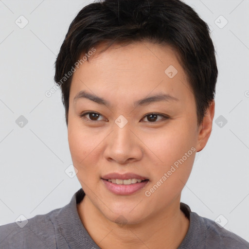 Joyful asian young-adult female with short  brown hair and brown eyes