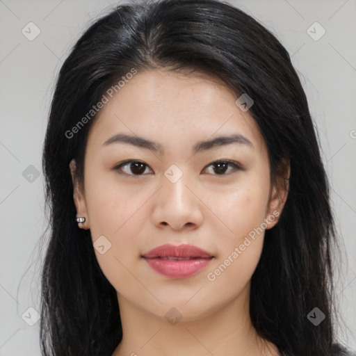 Joyful asian young-adult female with long  brown hair and brown eyes