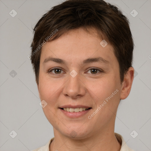 Joyful white young-adult female with short  brown hair and brown eyes