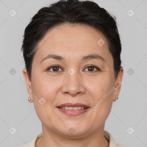 Joyful white adult female with short  brown hair and brown eyes