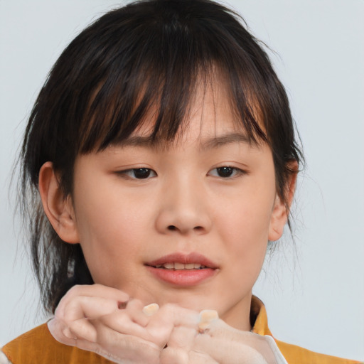 Neutral asian young-adult female with medium  brown hair and brown eyes