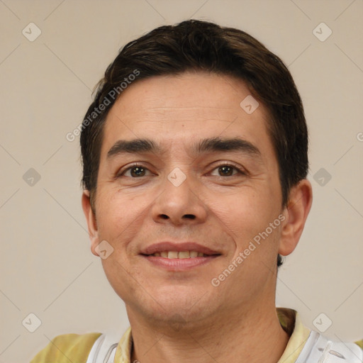 Joyful white adult male with short  brown hair and brown eyes