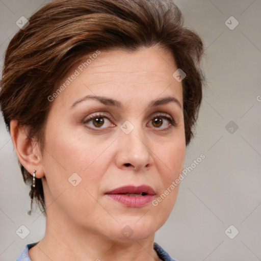 Joyful white adult female with short  brown hair and brown eyes