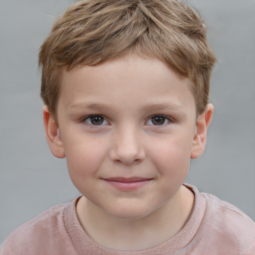 Joyful white child male with short  brown hair and grey eyes