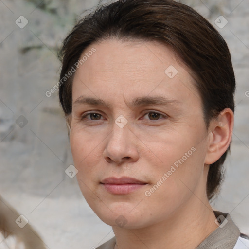 Joyful white adult female with short  brown hair and brown eyes