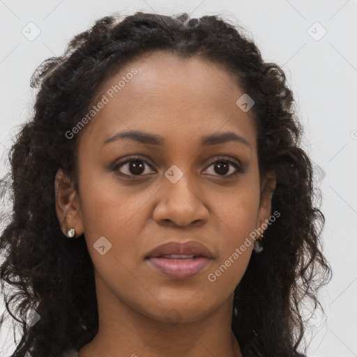 Joyful black young-adult female with long  brown hair and brown eyes