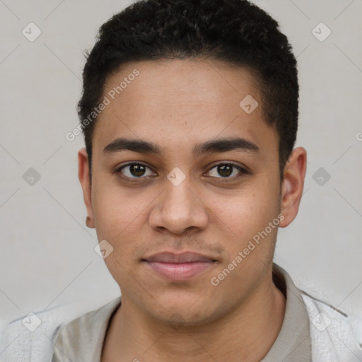 Joyful white young-adult male with short  black hair and brown eyes