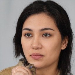 Neutral white young-adult female with medium  brown hair and brown eyes