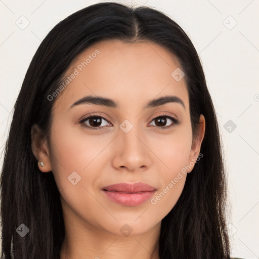 Joyful latino young-adult female with long  brown hair and brown eyes