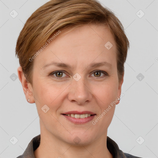 Joyful white adult female with short  brown hair and grey eyes