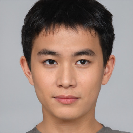 Neutral asian young-adult male with short  brown hair and brown eyes