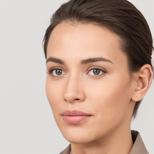 Neutral white young-adult female with medium  brown hair and brown eyes