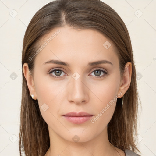 Neutral white young-adult female with long  brown hair and brown eyes