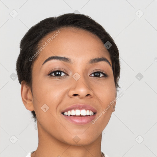 Joyful latino young-adult female with short  brown hair and brown eyes