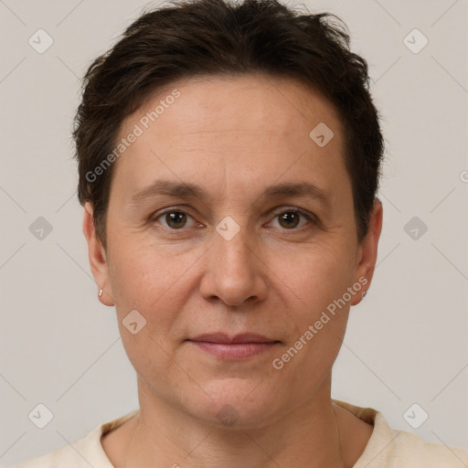 Joyful white adult female with short  brown hair and brown eyes