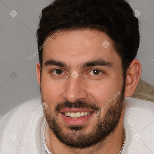 Joyful white young-adult male with short  brown hair and brown eyes