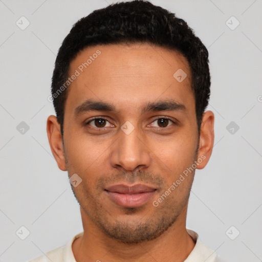 Neutral latino young-adult male with short  black hair and brown eyes