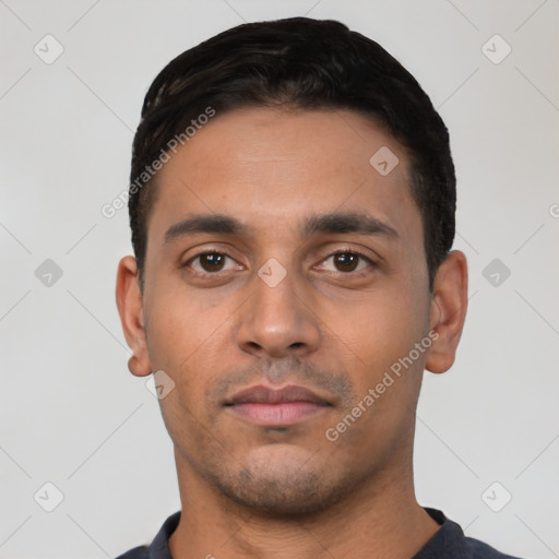 Neutral latino young-adult male with short  black hair and brown eyes