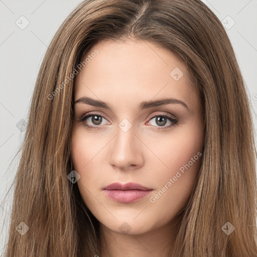 Neutral white young-adult female with long  brown hair and brown eyes