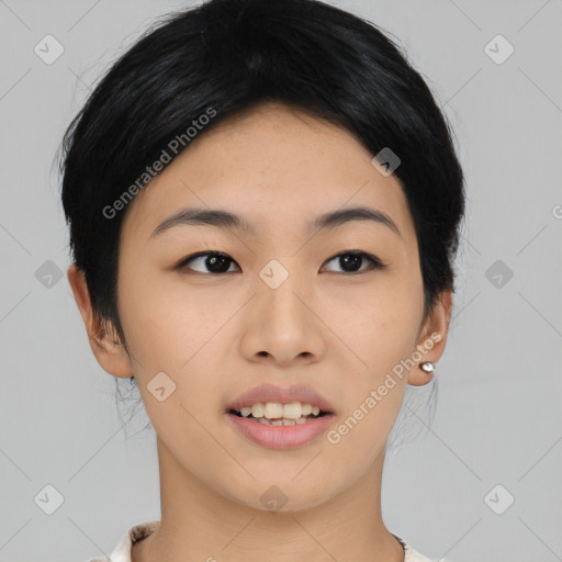 Joyful asian young-adult female with medium  black hair and brown eyes