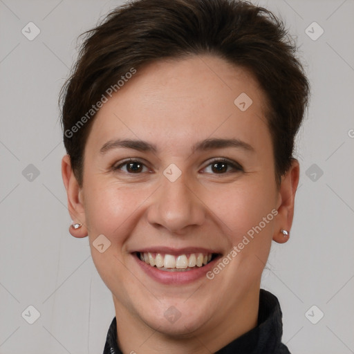 Joyful white young-adult female with short  brown hair and brown eyes