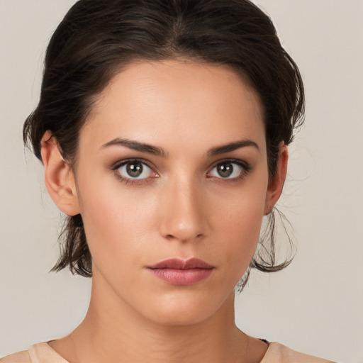 Neutral white young-adult female with medium  brown hair and brown eyes