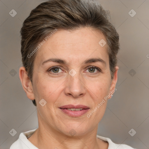 Joyful white adult female with short  brown hair and brown eyes