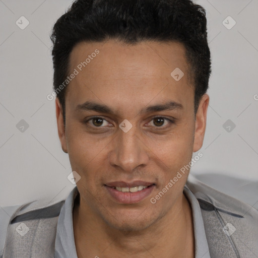 Joyful latino young-adult male with short  black hair and brown eyes