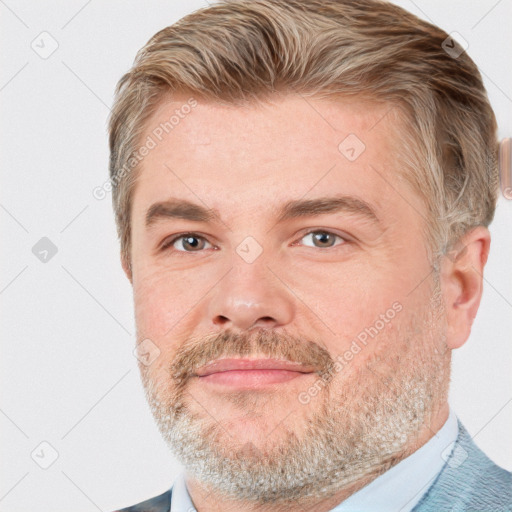 Joyful white adult male with short  brown hair and grey eyes