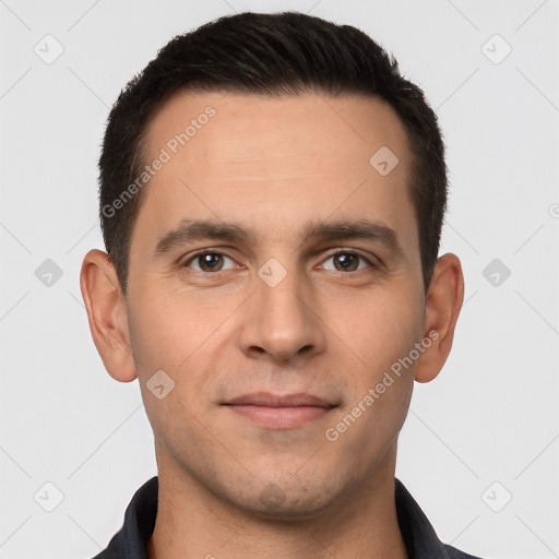 Joyful white young-adult male with short  brown hair and brown eyes