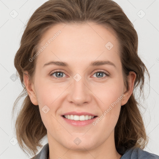 Joyful white young-adult female with medium  brown hair and blue eyes