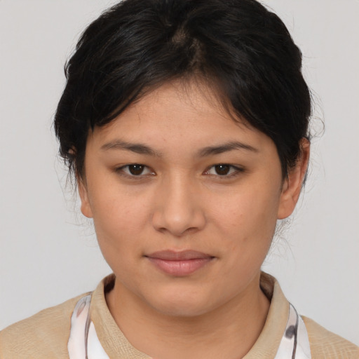 Joyful asian young-adult female with medium  brown hair and brown eyes
