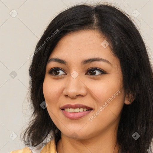 Joyful asian young-adult female with long  brown hair and brown eyes