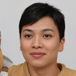 Joyful asian young-adult female with short  black hair and brown eyes