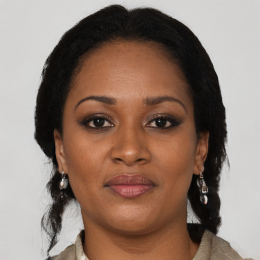 Neutral black young-adult female with medium  brown hair and brown eyes