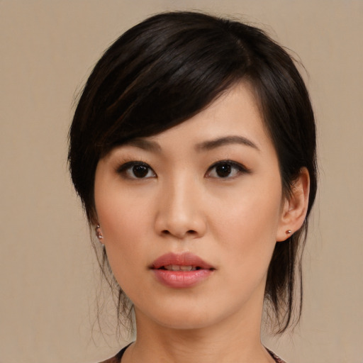 Neutral asian young-adult female with medium  black hair and brown eyes