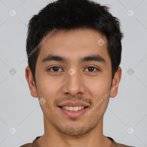 Joyful latino young-adult male with short  brown hair and brown eyes