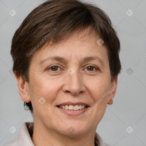 Joyful white adult female with short  brown hair and brown eyes