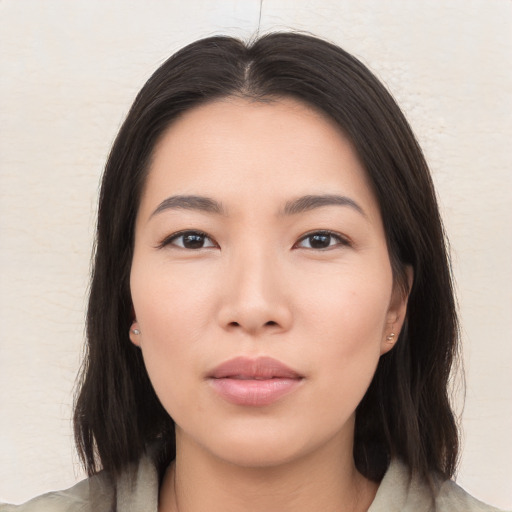 Neutral asian young-adult female with medium  brown hair and brown eyes