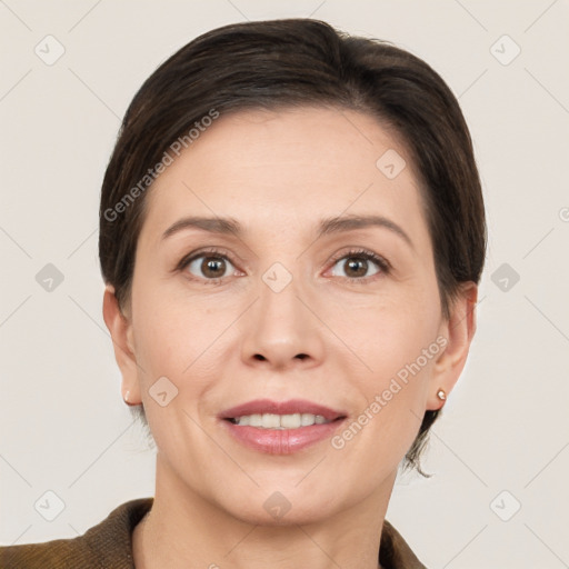 Joyful white adult female with short  brown hair and brown eyes