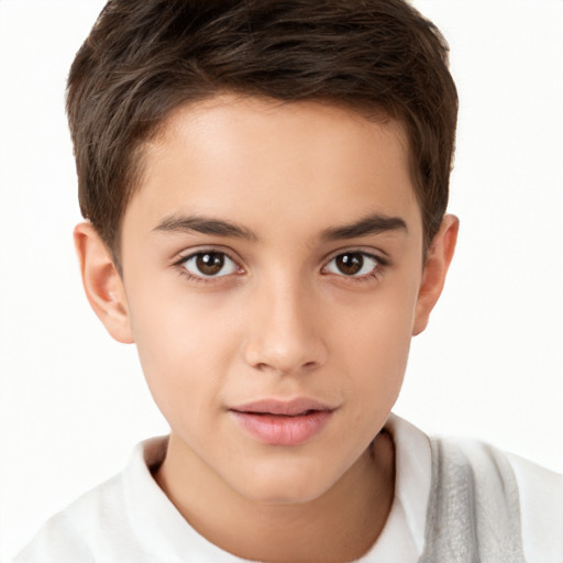 Joyful white child male with short  brown hair and brown eyes