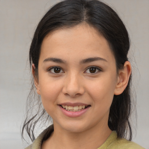 Joyful latino young-adult female with medium  brown hair and brown eyes