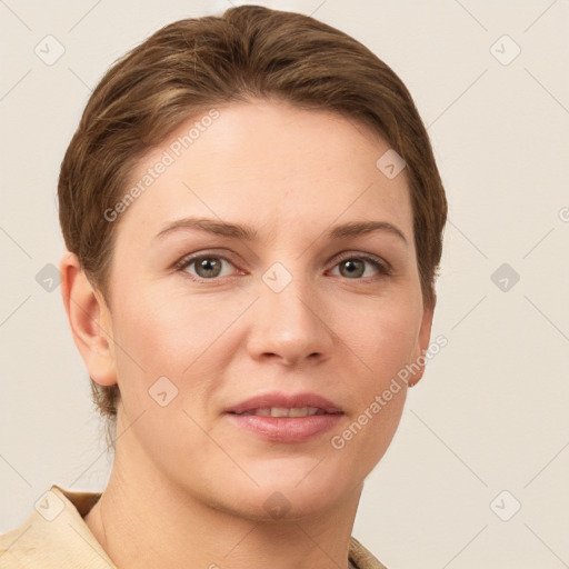 Joyful white young-adult female with short  brown hair and grey eyes